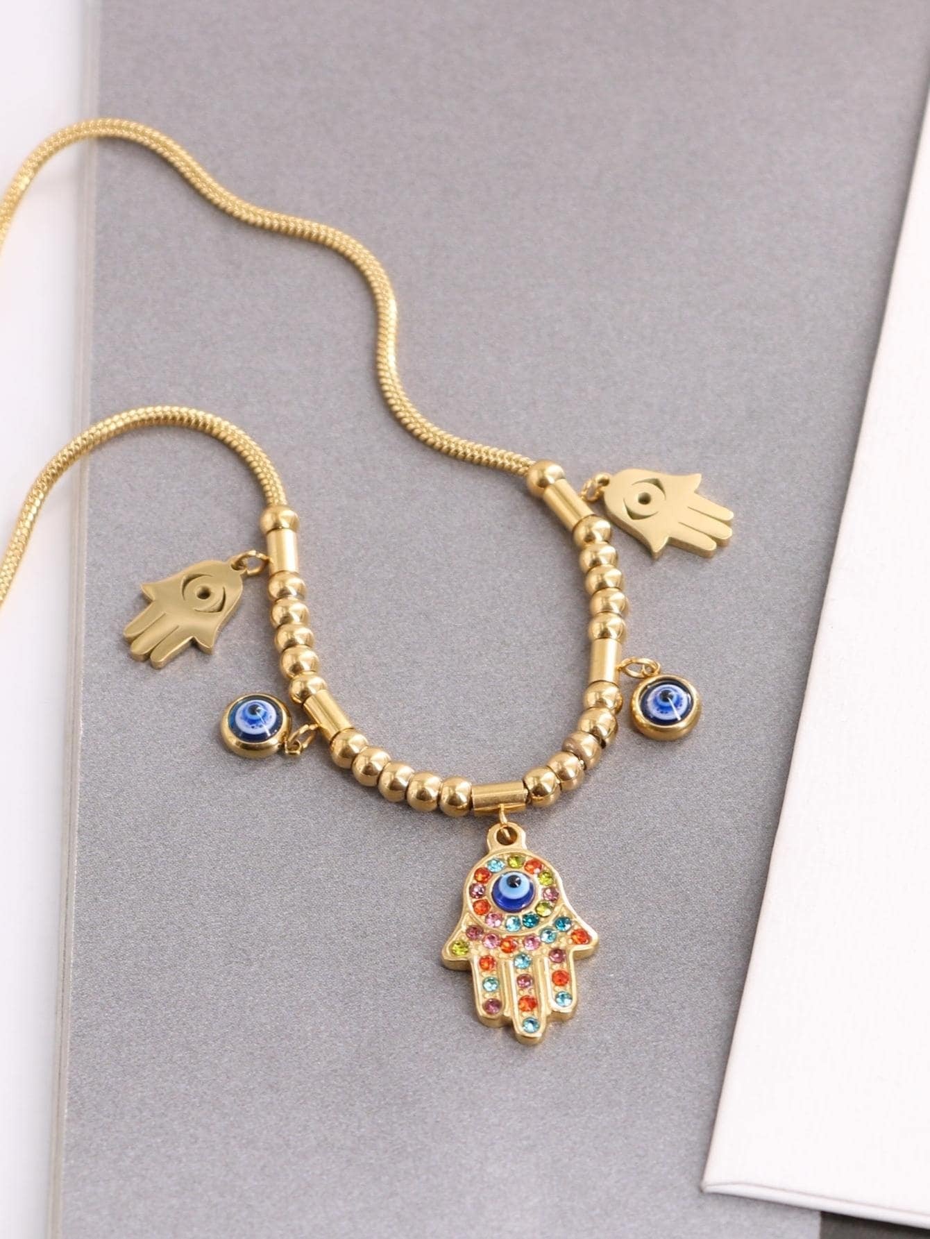 1Pc Gold-Tone European and American Style Luxury Light Colored Rhinestone & Deep Blue Hamsa Hand and Evil Eye Multi-Element Stainless Steel Necklace for Women